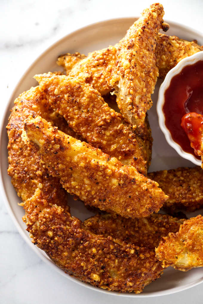 overhead shot of airfryer potato wedges on a serving plate