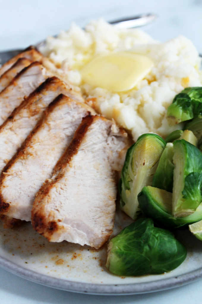 A plated serving of chipotle air fryer pork chops