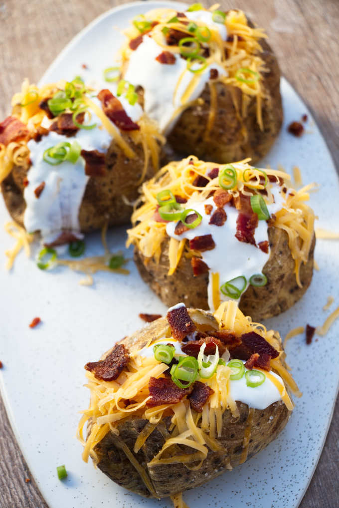 overhead photo of air fryer baked potatoes