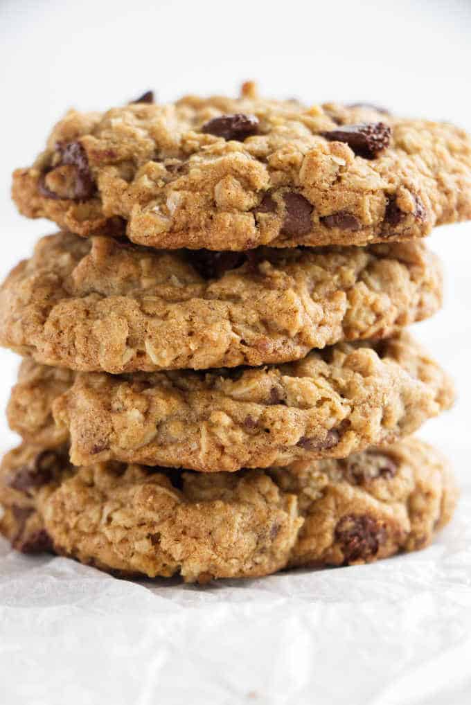 A stack of air fryer oatmeal cookies with chocolate chips, perfectly golden brown.