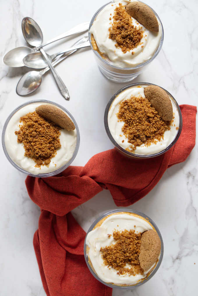 Overhead photo of 4 no bake cheesecake parfait desserts