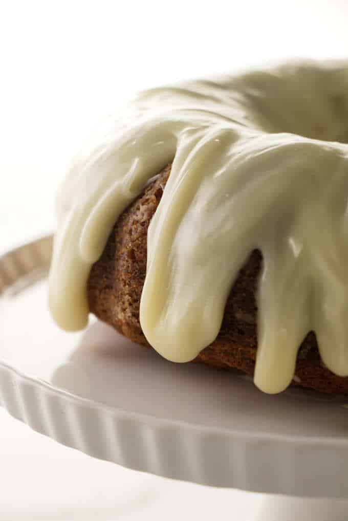 A banana bundt cake with cream cheese icing.