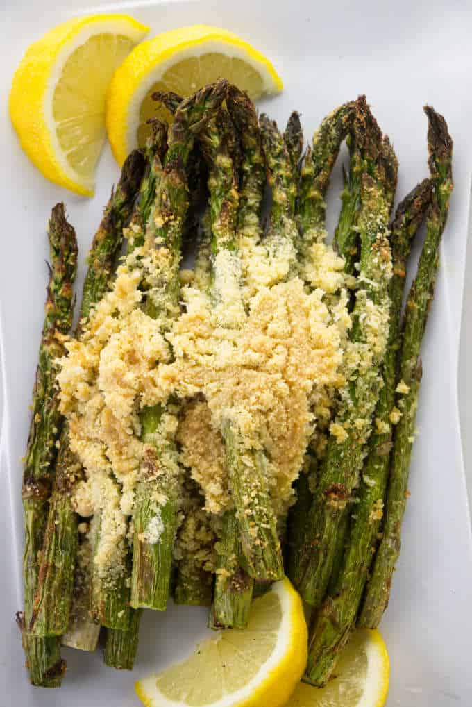 Asparagus with parmesan bread crumbs and lemons.