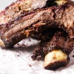 Traeger smoked beef ribs sliced and stacked.