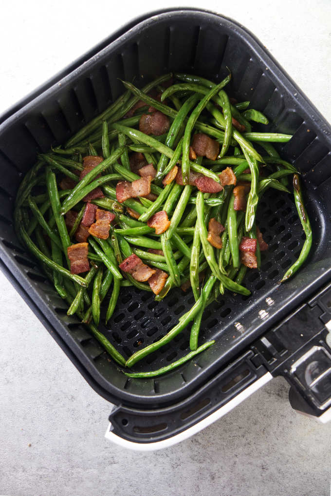 Green beans and bacon in an air fryer.