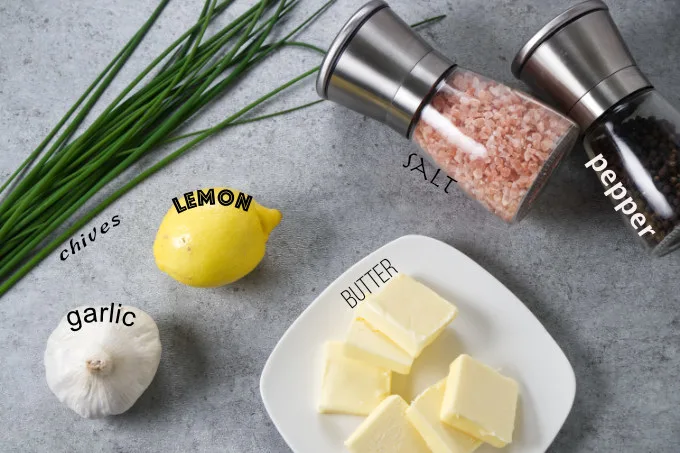Ingredients used to make lemon garlic chive butter for salmon.