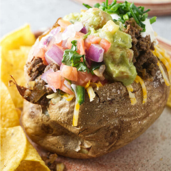 An air fryer stuffed baked potato with taco meat.