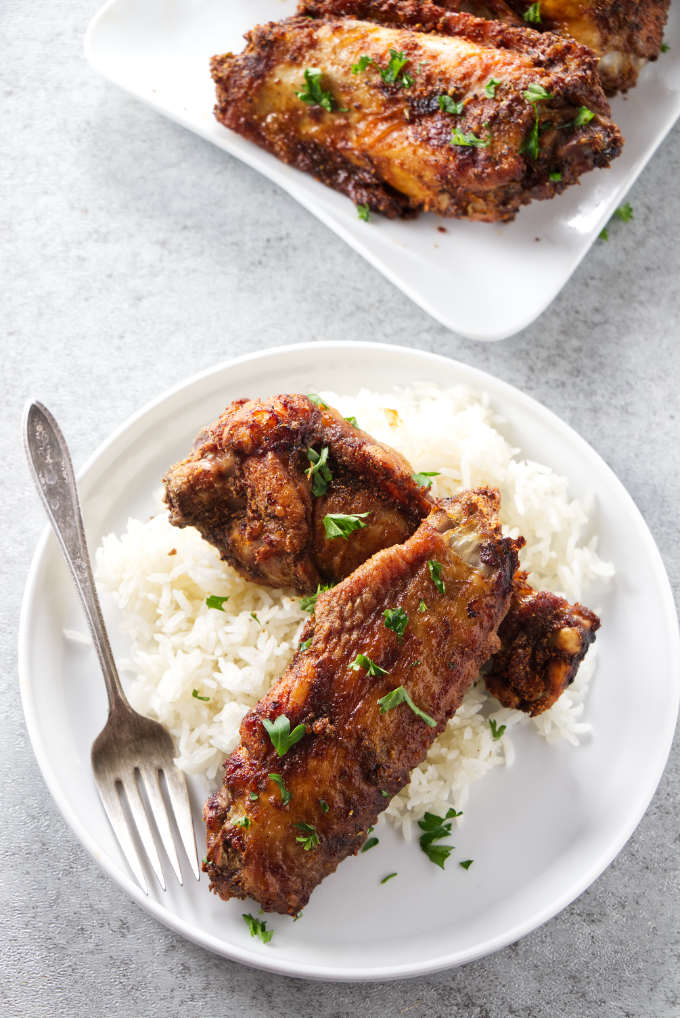 A serving plate with cajun turkey wings.