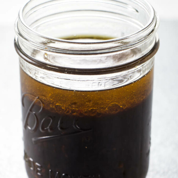 A jar filled with steak marinade.