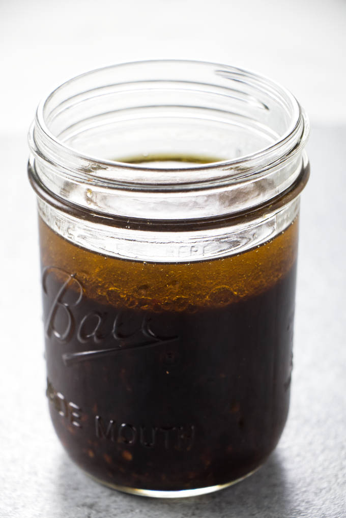 A jar filled with steak marinade.