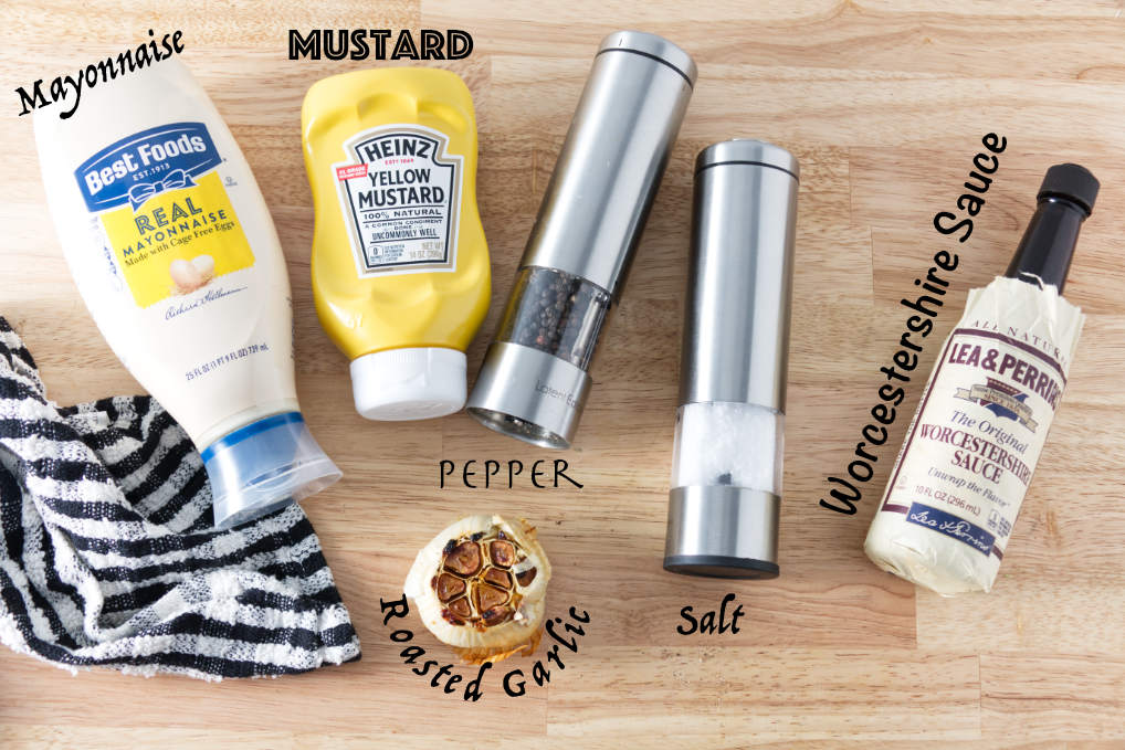 ingredients for donkey sauce: mayonnaise, mustard, salt, pepper, roasted garlic, worcestershire sauce