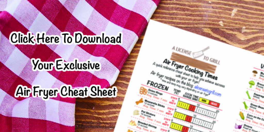 air fryer cheat sheet preview sitting on wood desk with text "click here to download your exclusive air fryer cheat sheet"