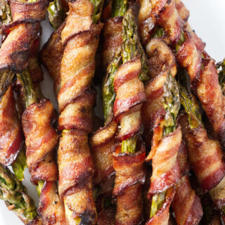 A pile of smoked bacon wrapped asparagus.