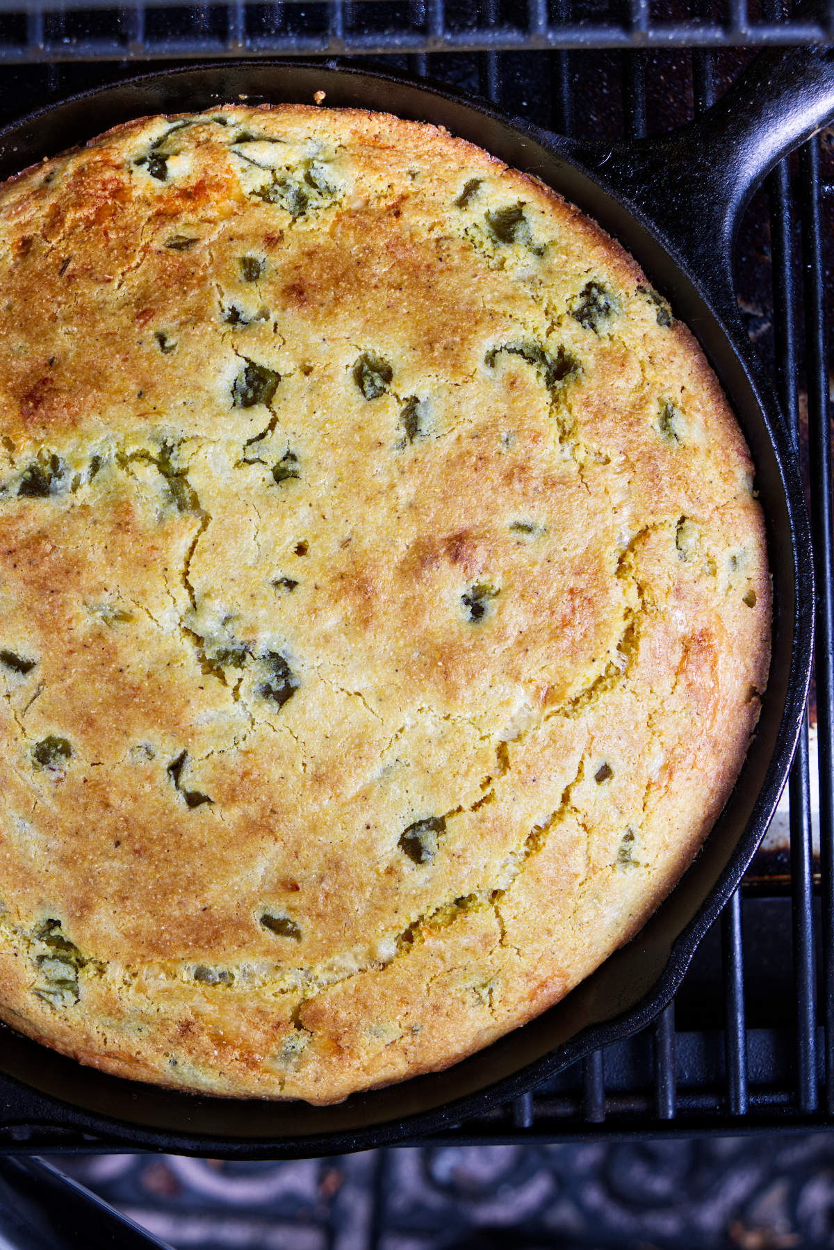 Cornbread cooking in a Traeger pellet grill.