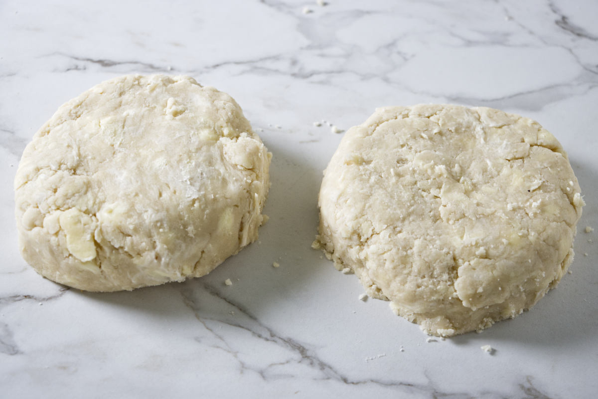 Shaping pie dough into two disks.