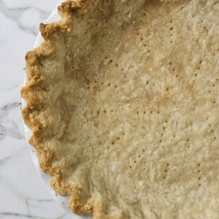 blind-baked pie crust in a pie plate