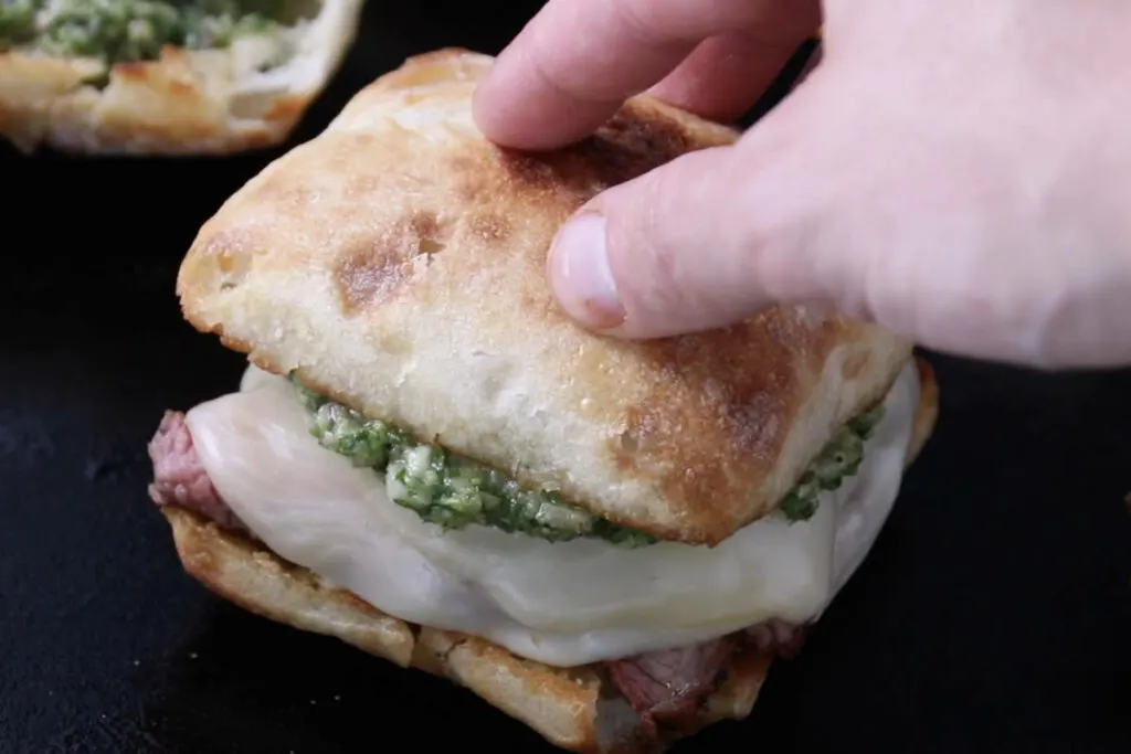 assembling tri-tip sandwich on blackstone