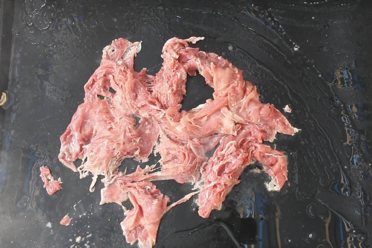 cooking sliced steak on the Blackstone griddle