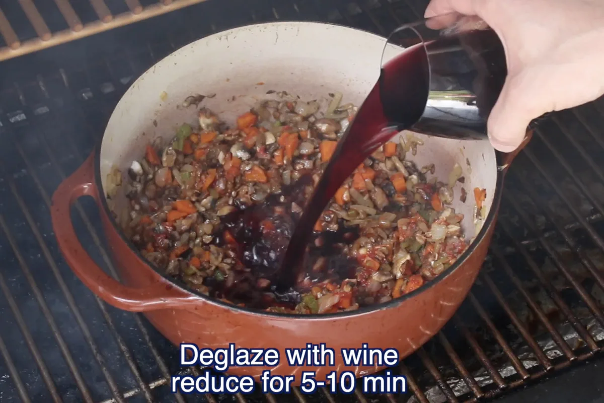 deglazing soffritto in dutch oven with wine
