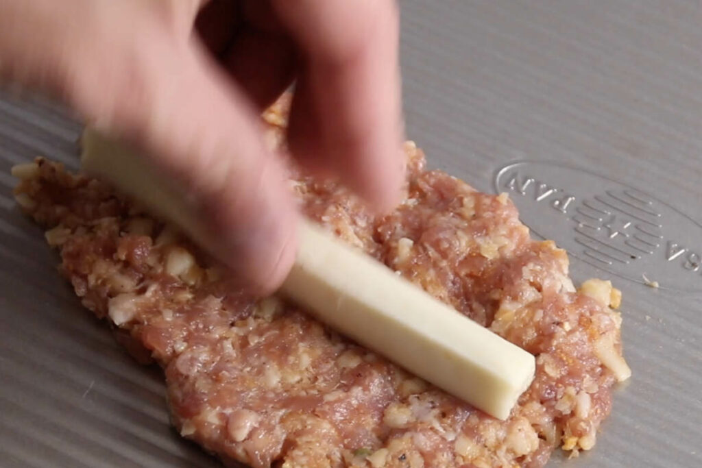 sausage patty with cheese stick stuffing