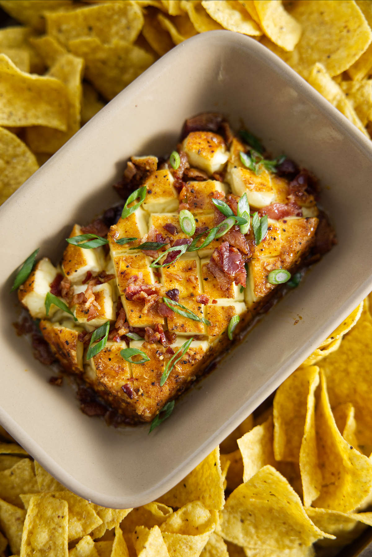 smoked cream cheese in dish surrounded by tortilla chips