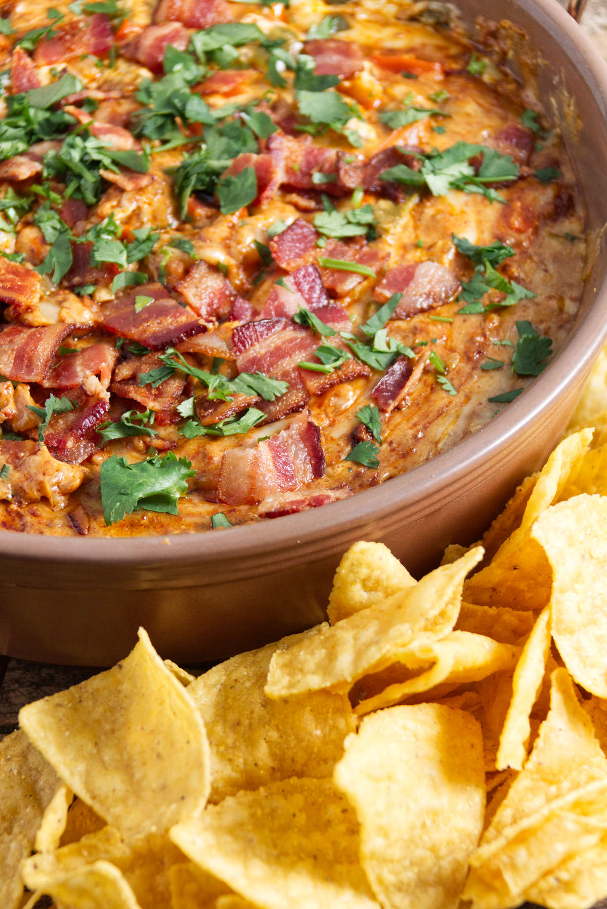 smoked queso dip in a large bowl with chips