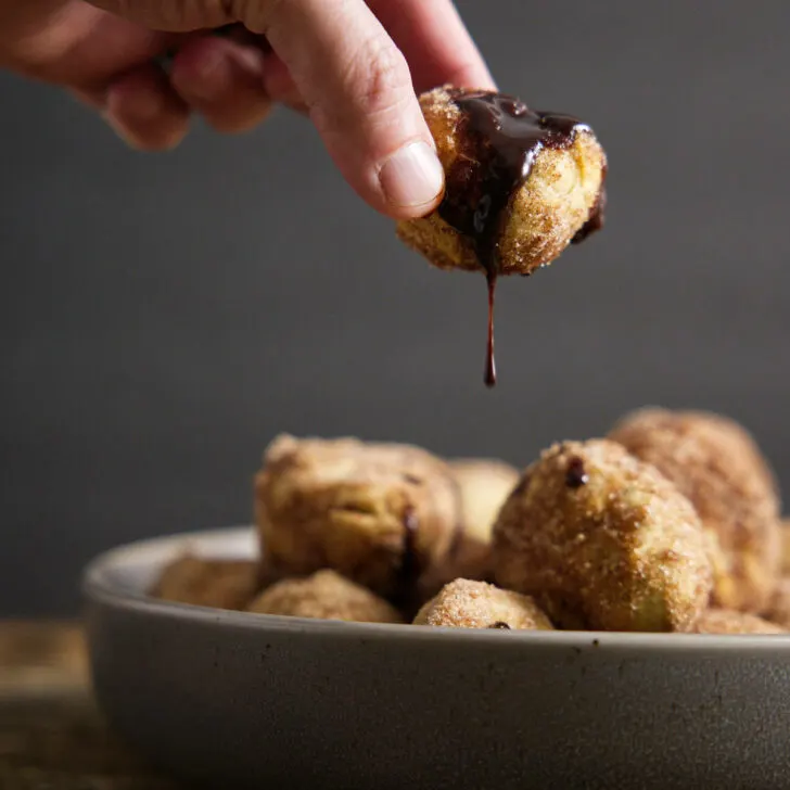 chocolate sauce dripping from donut holes
