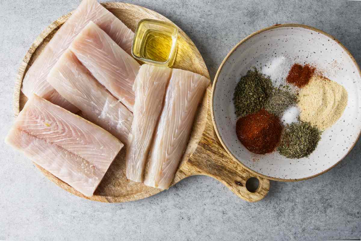 Ingredients for air fryer mahi mahi, including blackening spices and oil.