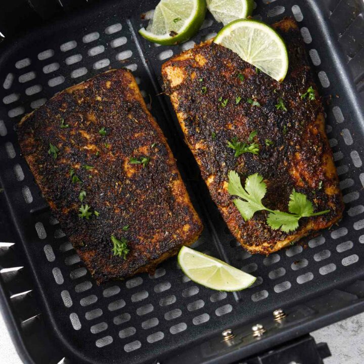 blackened mahi mahi fillets in air fryer basket