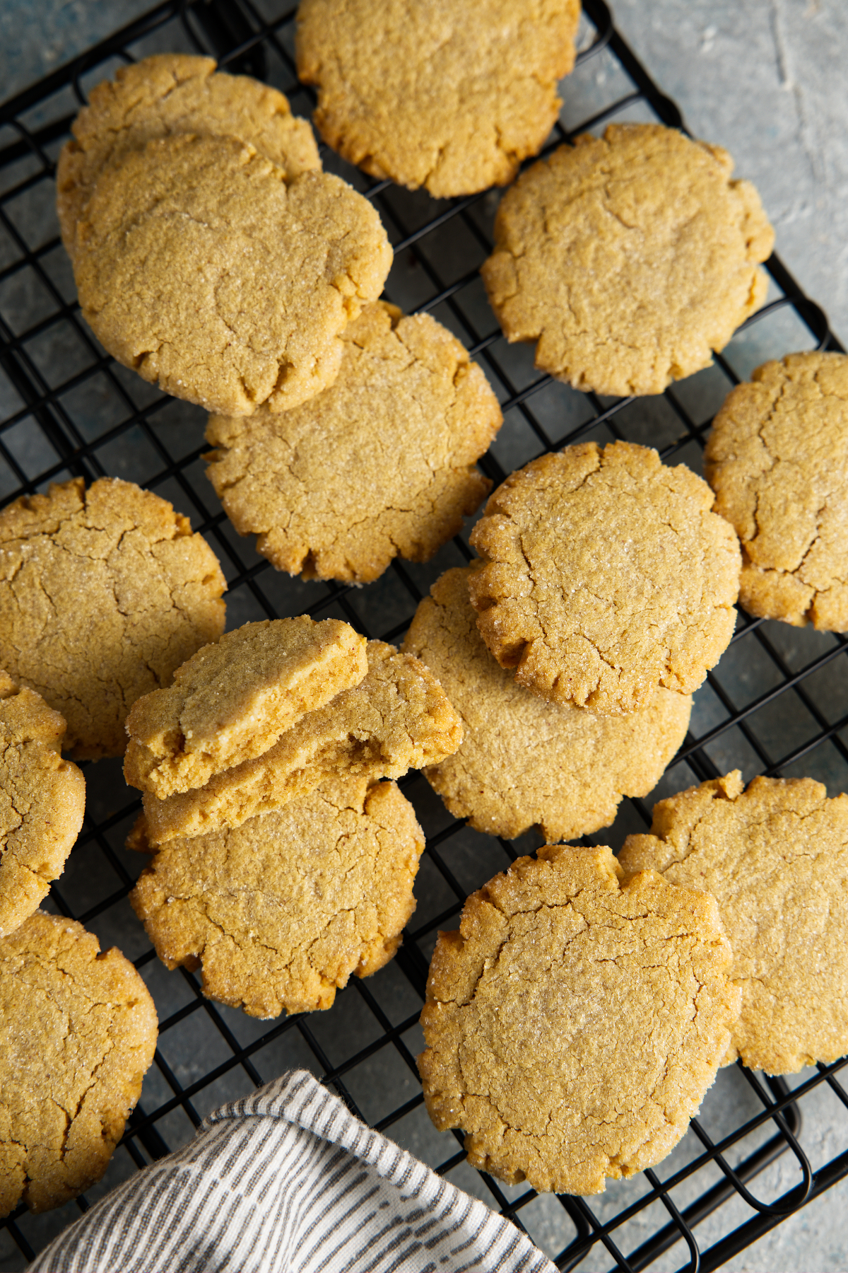 Air fryer peanut butter cookies cooling on a wire rack.