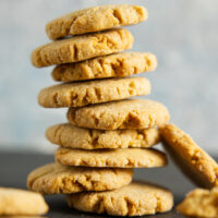 Large stack of peanut butter cookies.