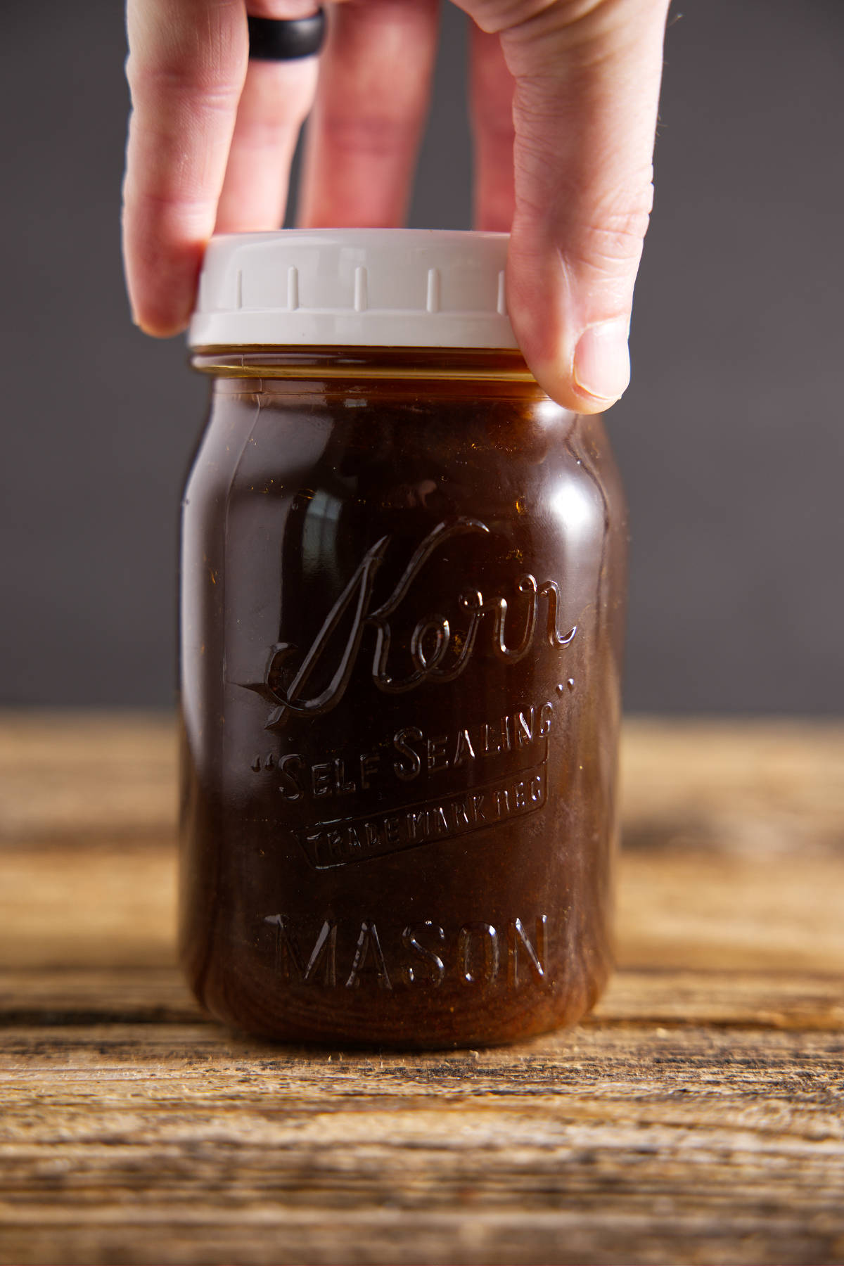 Pork loin marinade for smoker in Mason jar.