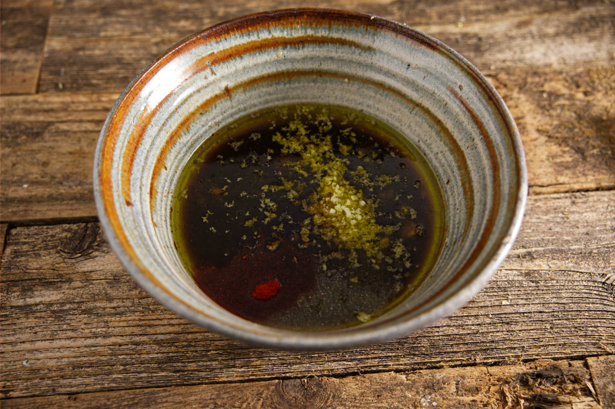 Combining ingredients for pork marinade.