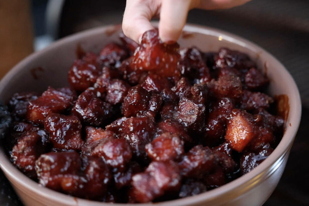 Pan of pork belly burnt ends after finishing smoking.