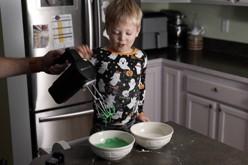 Mixing color in the royal icing.