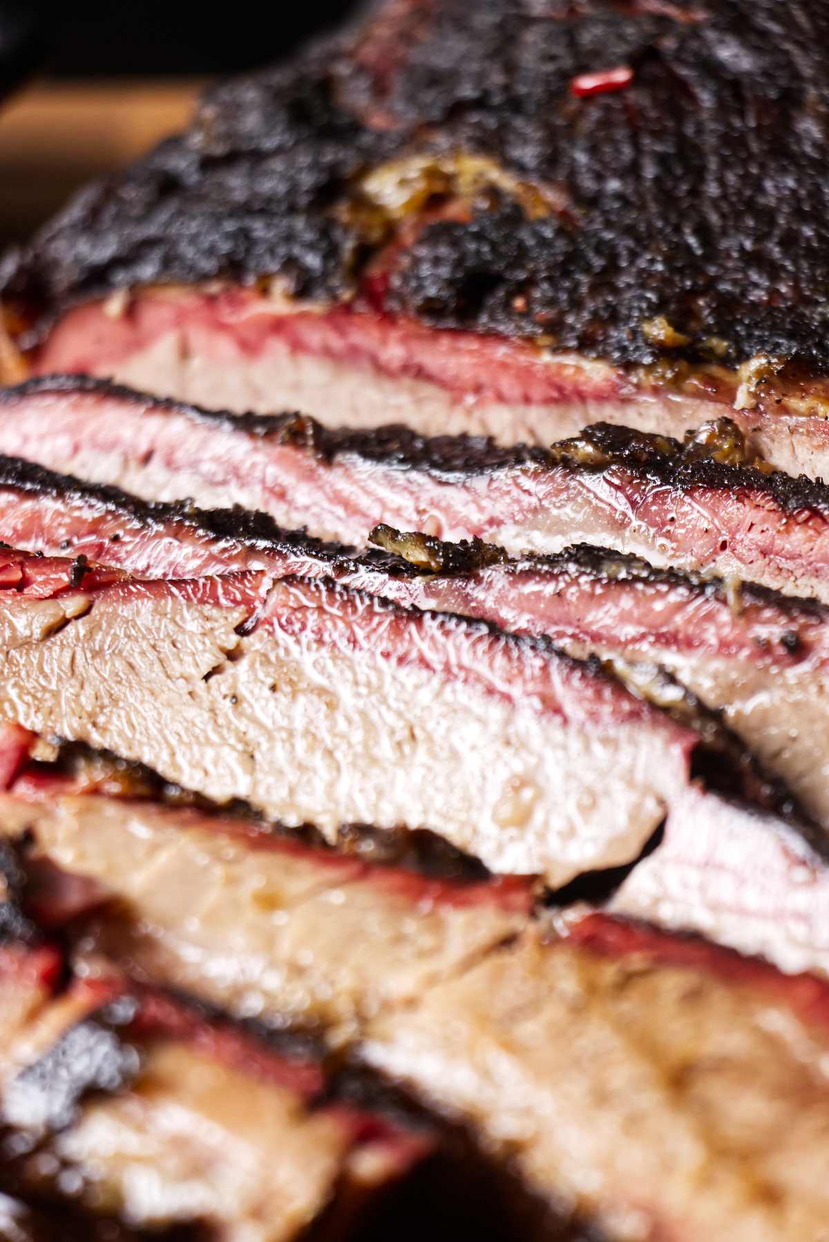 Close up of a smoked brisket showing the smoke rings.