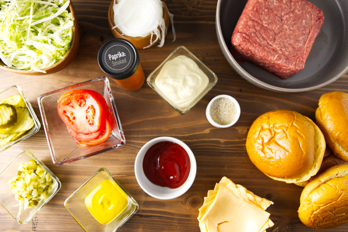 Ingredients for Blackstone smash burgers arranged before cooking.